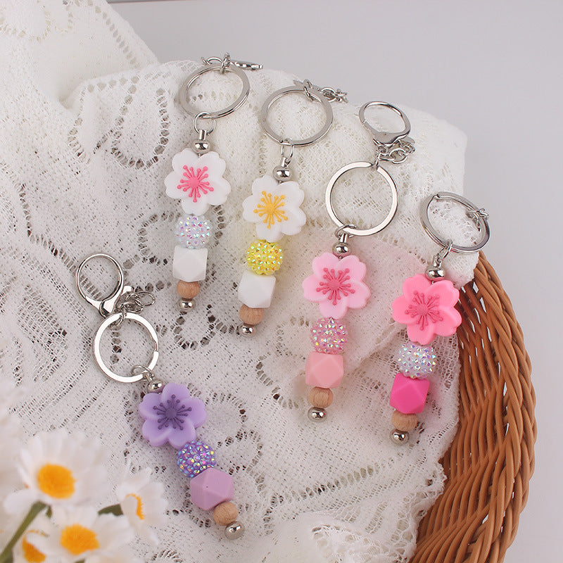 Wholesale Begonia Daisy Flower Beaded Tassel Keychain